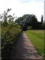 TM2660 : Footpath beside Kettleburgh Village Green to St.Andrew's Church by Geographer