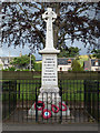 War memorial with park and houses in Lumsden