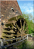 SJ9752 : Mill wheel at Cheddleton Flint Mill, Staffordshire by Roger  Kidd