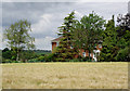 Barley field and house near Claverley, Shropshire