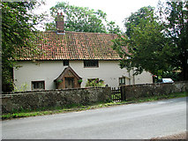 TM4481 : Traditional cottage beside St Margaret's church, Stoven by Evelyn Simak