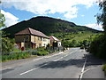 Semi-detached homes in Blaenrhondda with Mynydd Ty-isaf behind