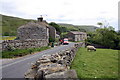 Postal delivery at Scar Houses on the Muker road from Thwaite