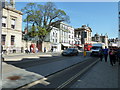 Looking across to a phone box in High Street