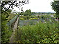 Footbridge with view of sewage works