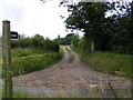 TM4266 : Footpath to Pretty Road & entrance to Dovehouse Farm by Geographer