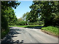 Gate Bridge Road joins Warren Lane