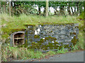 Old milk churn stand near Stags Head, Ceredigion