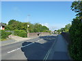 Approaching a railway bridge in Gudge Heath Lane