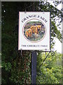TM3677 : Grange Farm sign by Geographer