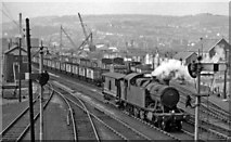 SS6693 : Swansea East Dock railway yards, with engine-&-brake by Ben Brooksbank