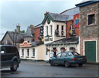 R9645 : "Golden Vale" pub and Chinese takeaway in Dundrum, County Tipperary by Neil Theasby