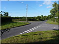 SO7999 : Road junction near Patshull pool by Richard Law