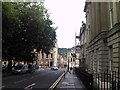 View of tree-covered hill from Queen Square