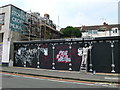 Artist at work at the Peoples Republic of Stokes Croft