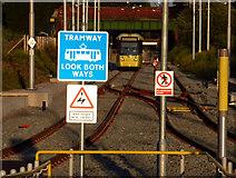 SJ8293 : Signs at the south east end of St Werburgh's Road Metrolink station, Chorlton by Phil Champion