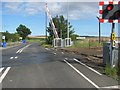 NU1233 : Level crossing, Belford Junction by Richard Webb