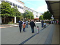 Pedestrians passing New Look in Queens Square