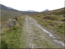 J2923 : The Banns Road with Middle Mournes in the background by Eric Jones