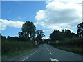 Chelford Road and Henbury village sign