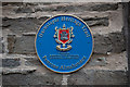 A plaque on the wall of the Penrose Almshouses, Litchdon Street, Barnstaple