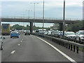 M4 bridge carries Riding Court Road