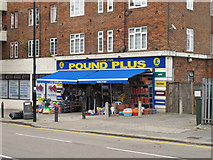 TQ2081 : Pound Plus shop on Horn Lane by David Hawgood