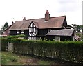 Timber lodge near Pickhurst Green