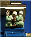 Wooden carved relief of drinkers, Forest Gate