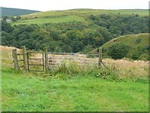 SD9027 : Gate on a footpath below Raw Hey, Todmorden by Humphrey Bolton