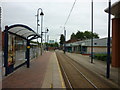 Catching the tram to Manchester