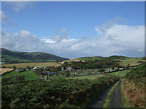 SC4991 : View towards Maughold Parish Church and the graveyard by Richard Hoare