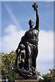 Statue on war memorial