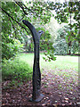 Sustrans milepost in Ravensbury Park