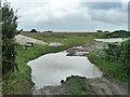 TQ5505 : A  wet field entrance by Robin Webster