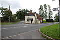 Looking over A518 to Cottage on Junction of Hixon Road