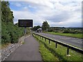 NH5952 : Looking east on the A835 by Richard Dorrell