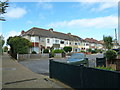 Looking from the Privett Path towards houses in Herbert Road