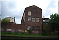 Derelict factory by the canal