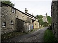 Cottages at Prior Hall and lane to Priory Farm