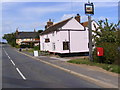 TM3046 : The Plough Inn & Post Office 1,Ipswich Avenue, Sutton Postbox by Geographer