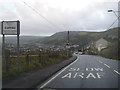 Cymer Road at Caerau village boundary sign