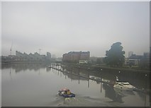 TQ2676 : Battersea Reach, from a train crossing the Battersea railway bridge on a foggy morning by Christopher Hilton