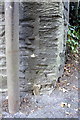 Benchmark at entrance to footpath to Letcombe Regis