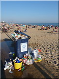 SZ0790 : Westbourne: overflowing bin on the prom by Chris Downer