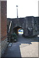 Towpath arch of Burford Bridge with steps down from Bridge Street