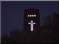 Pink Cross at night