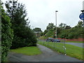 Train glimpsed from the Wing Road roundabout