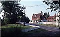 Oast house and white picket fencing in Hever Road