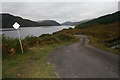 NN0592 : Road by Loch Arkaig by Peter Bond